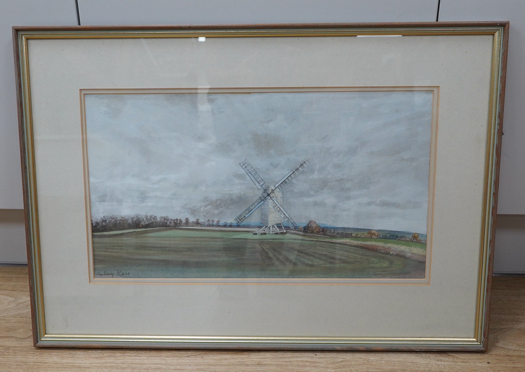 Anthony Kerr (b.1924), heightened watercolour, Rural landscape with windmill, signed, 27 x 48cm. Condition - fair